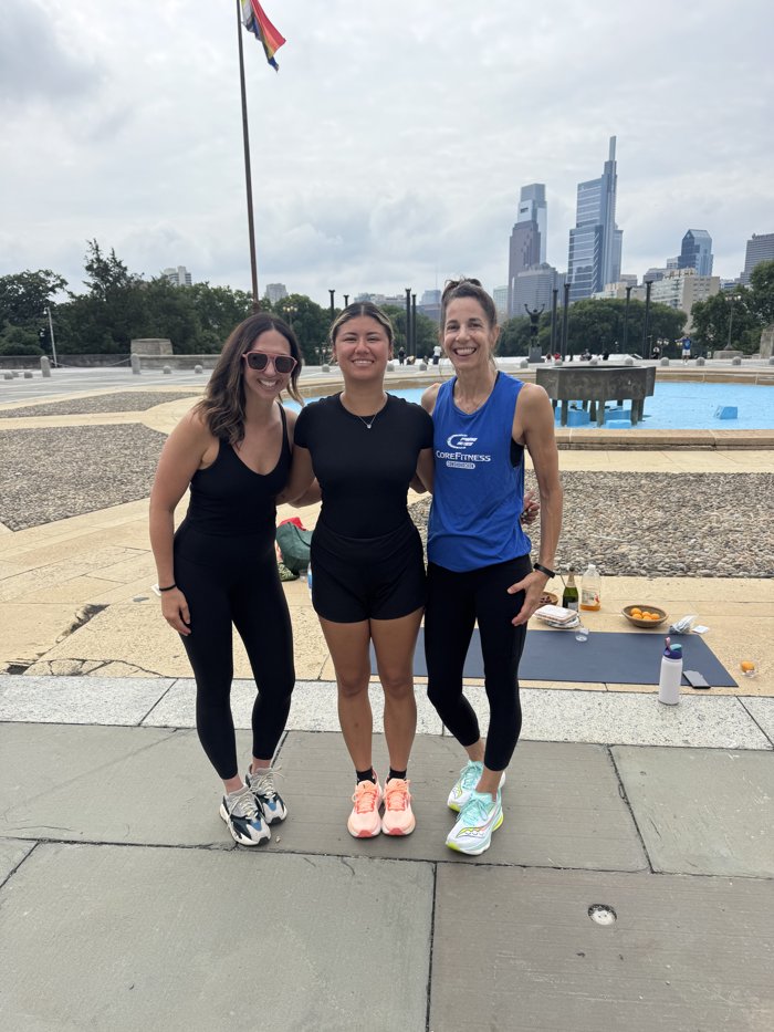 Diana Sparkles with her running friends overlooking the Philadelphia skyline